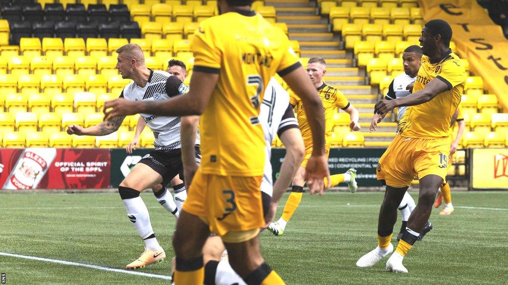 Livingston's Joel Nouble (right) breaks the deadlock