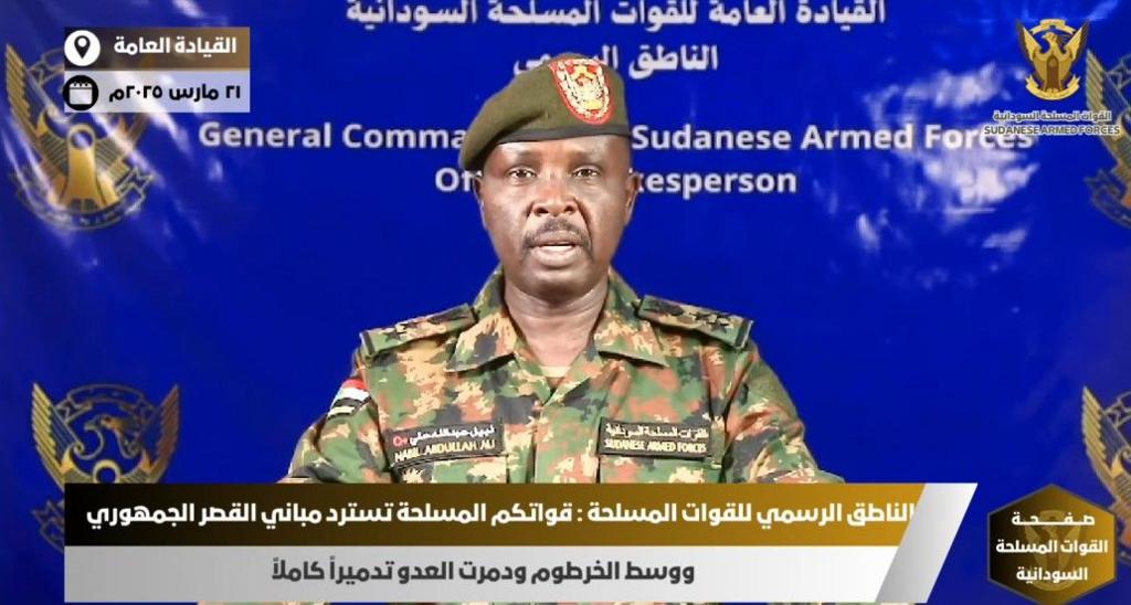 A screengrab from Sudanese TV showing the army spokesperson Nabil Abdallah announcing the palace recapture 