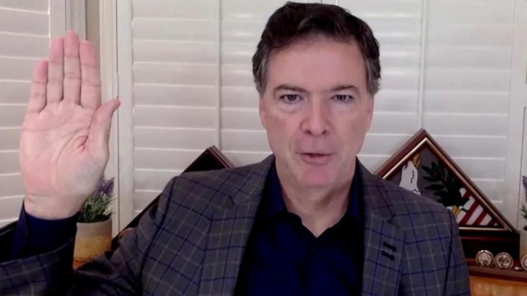  James Comey, former director of the Federal Bureau of Investigation (FBI), is seen in a frame grab from a video feed as he is sworn in remotely from his home during a Senate Judiciary Committee hearing