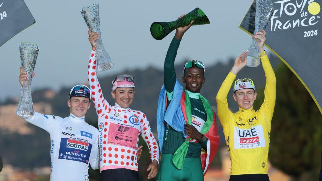 The 2024 Tour de France jersey winners Remco Evenepoel, Richard Carapaz, Biniam Girmay and Tadej Pogacar
