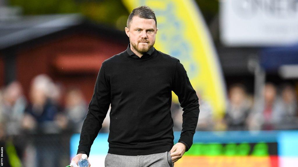 Jimmy Thelin on the sidelines of a football match