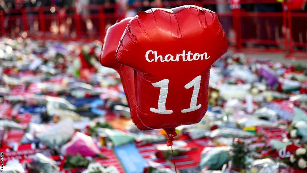 Balloons at a scarf stall in honour of Sir Bobby Charlton ahead of the Premier League match between Manchester United and Manchester City at Old Trafford