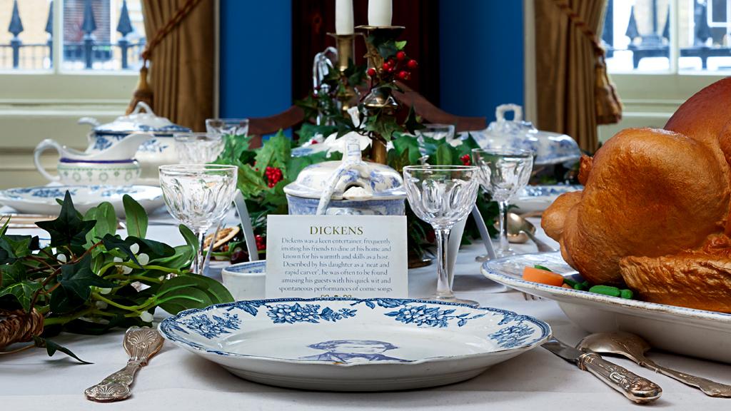 Dining table laid for Christmas Dinner - Dickens Museum