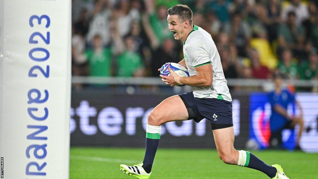 Johnny Sexton is already celebrating becoming Ireland's record points scorer as he runs in for his try