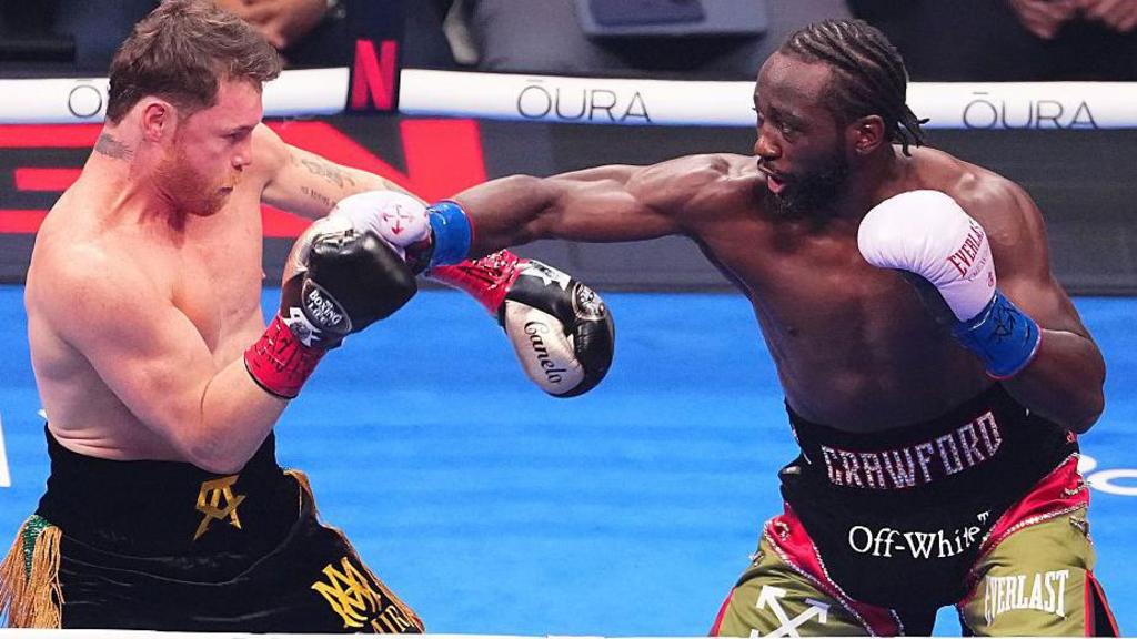 Saul Canelo Alvarez and Terence Crawford in the ring