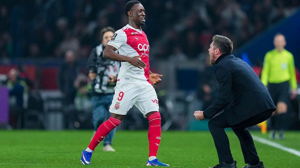 Folarin Balogun of AS Monaco celebrates after scoring his team's third goal with Sebastien Pocognoli