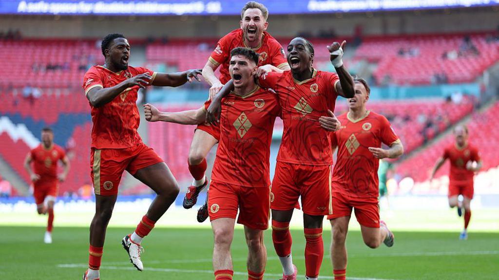 Whitstable Town players celebrate scoring
