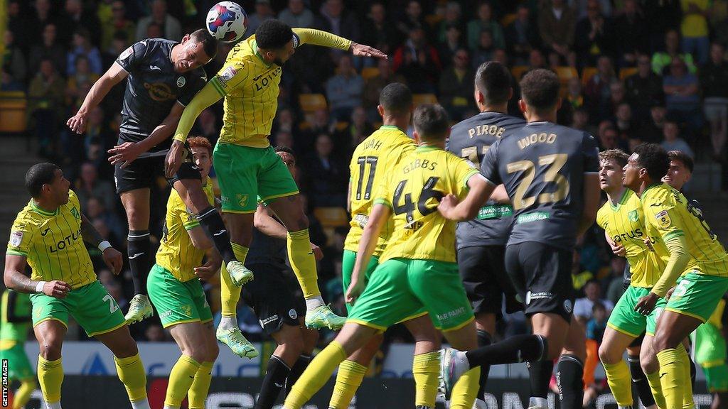 Swansea defender Joel Latibeaudiere rises to head home just the fourth goal of his senior career