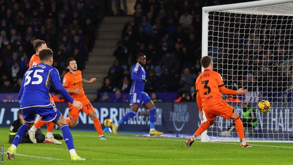 Leif Davis scores an own goal for Ipswich against Leicester