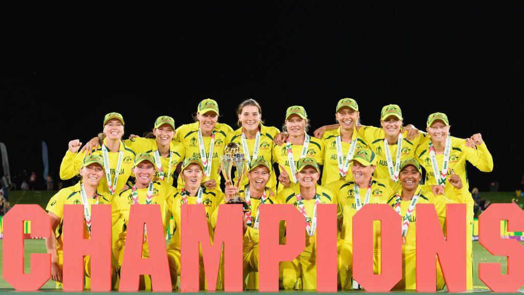Australia with the trophy in 2022.