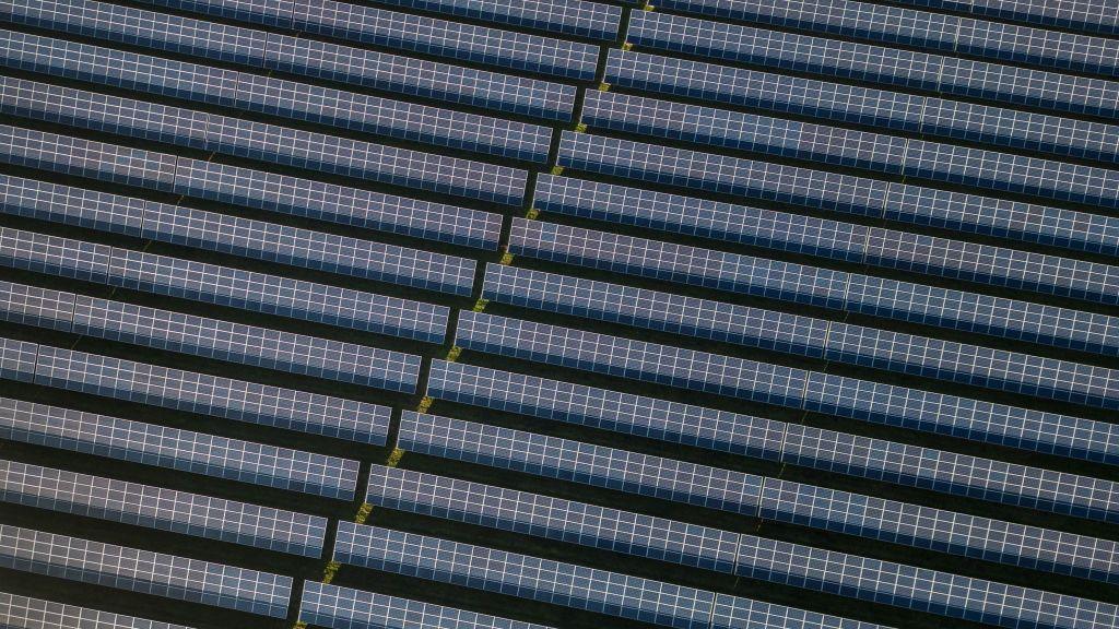 Aerial view of solar panels at a large solar farm