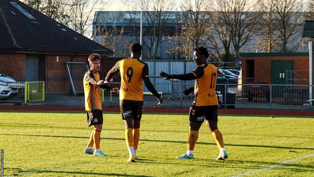 Wilfried Bony celebrates his goal in Newport development game