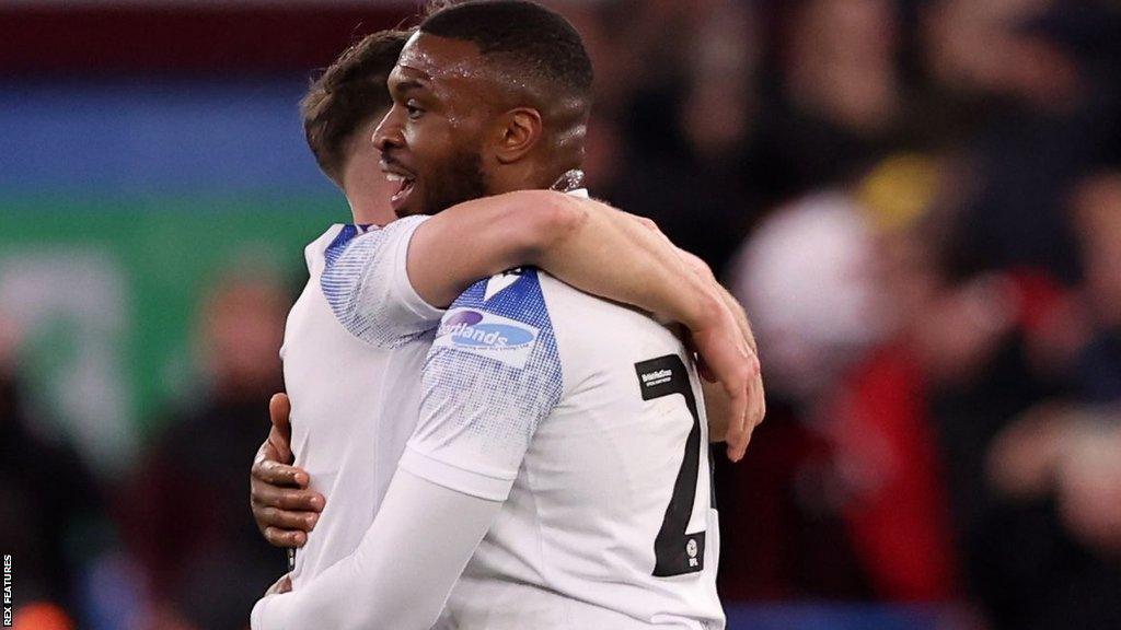 David Amoo came off the bench to help Stevenage turn it round to win 2-1 at Aston Villa in the FA Cup third round in his final appearance