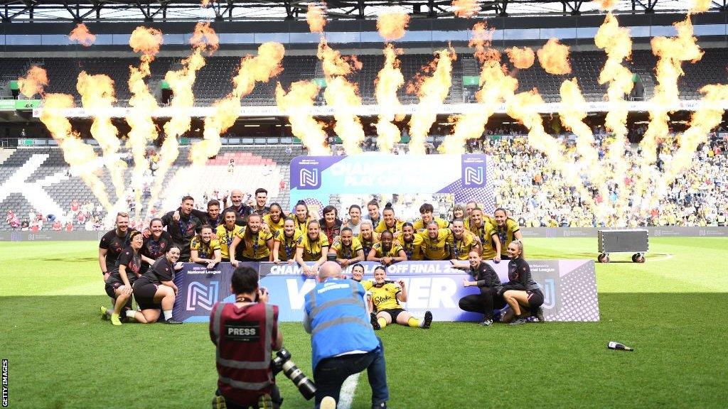 Watford players and staff celebrate their play-off final win over Nottingham Forest