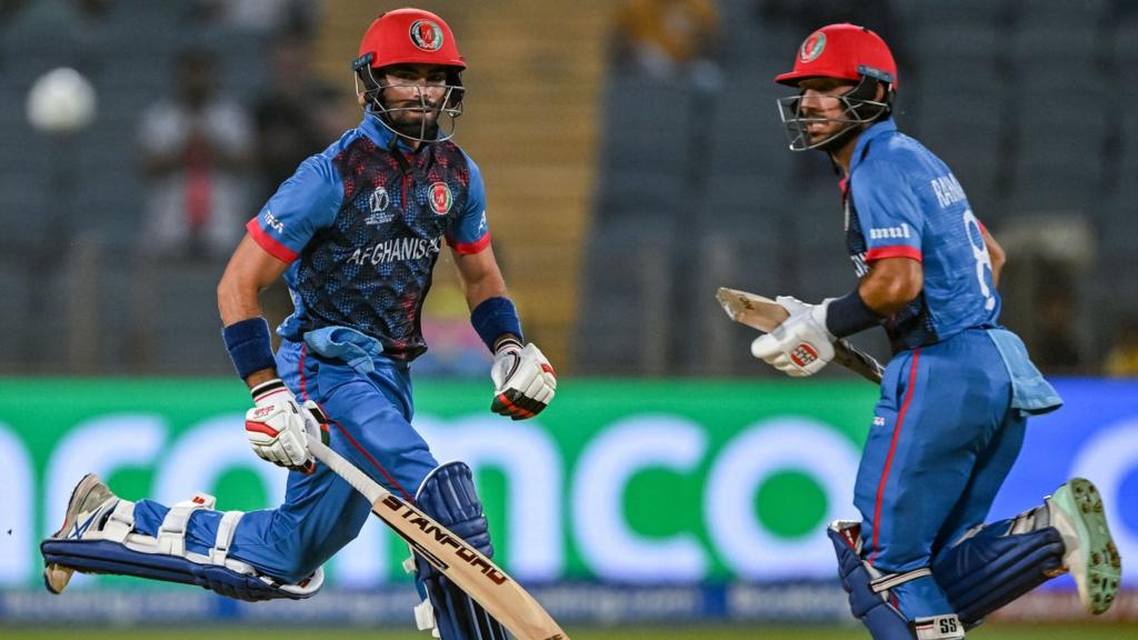 Afghanistan's Rahmat Shah and Ibrahim Zadran run between the wickets