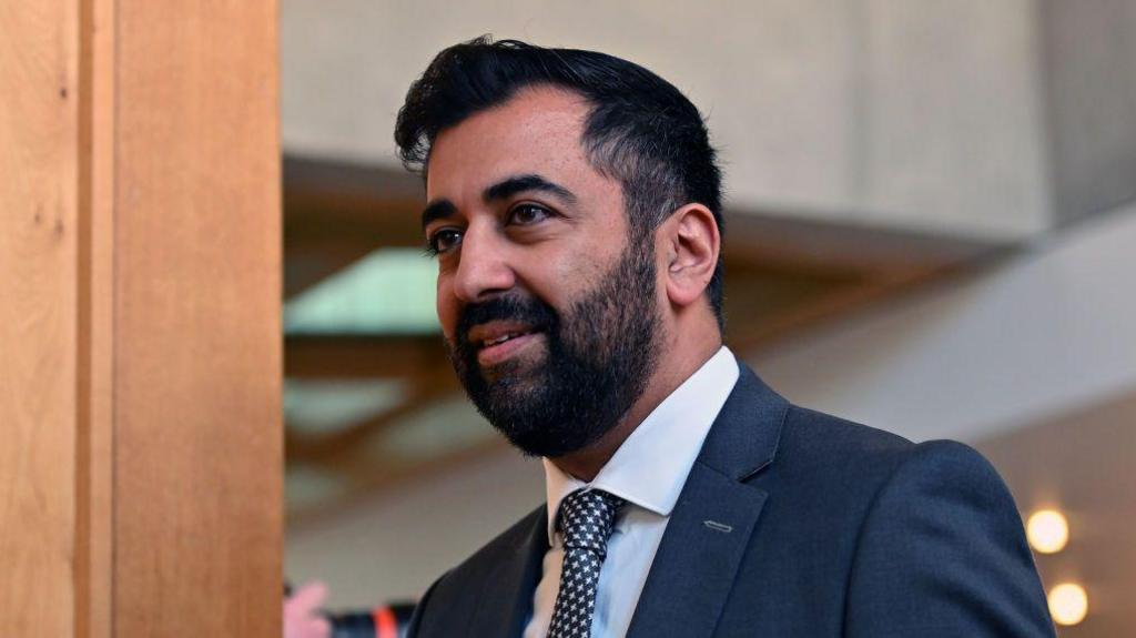 Former First Minister Humza Yousaf on the way to the chamber of the Scottish Parliament for First Minister's Questions