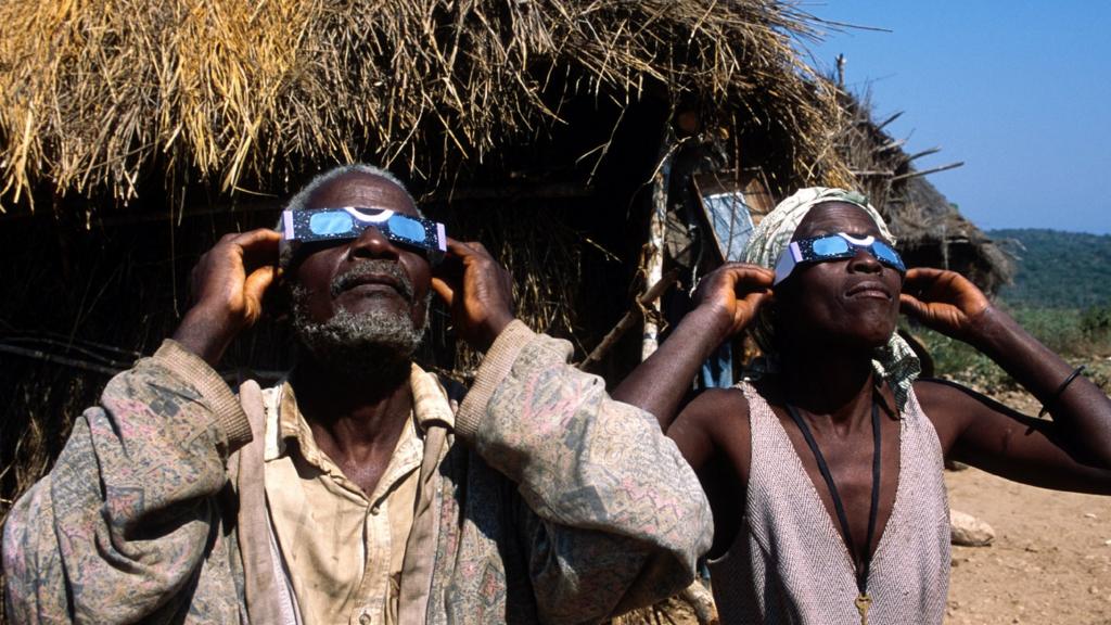 People watching a solar eclipse