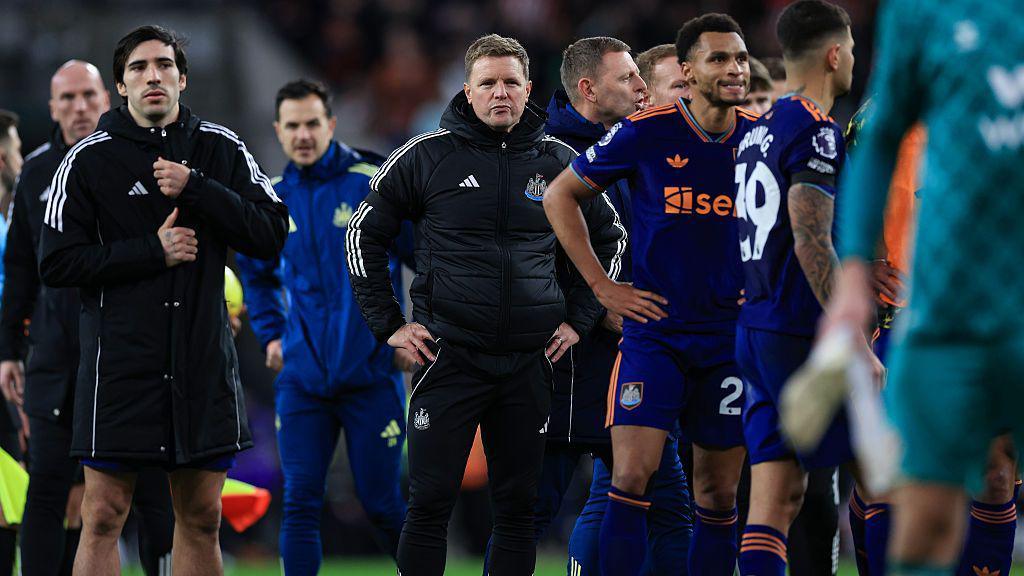 Eddie Howe and his Newcastle United players applaud the away end after the defeat over Sunderland at the Stadium of Light