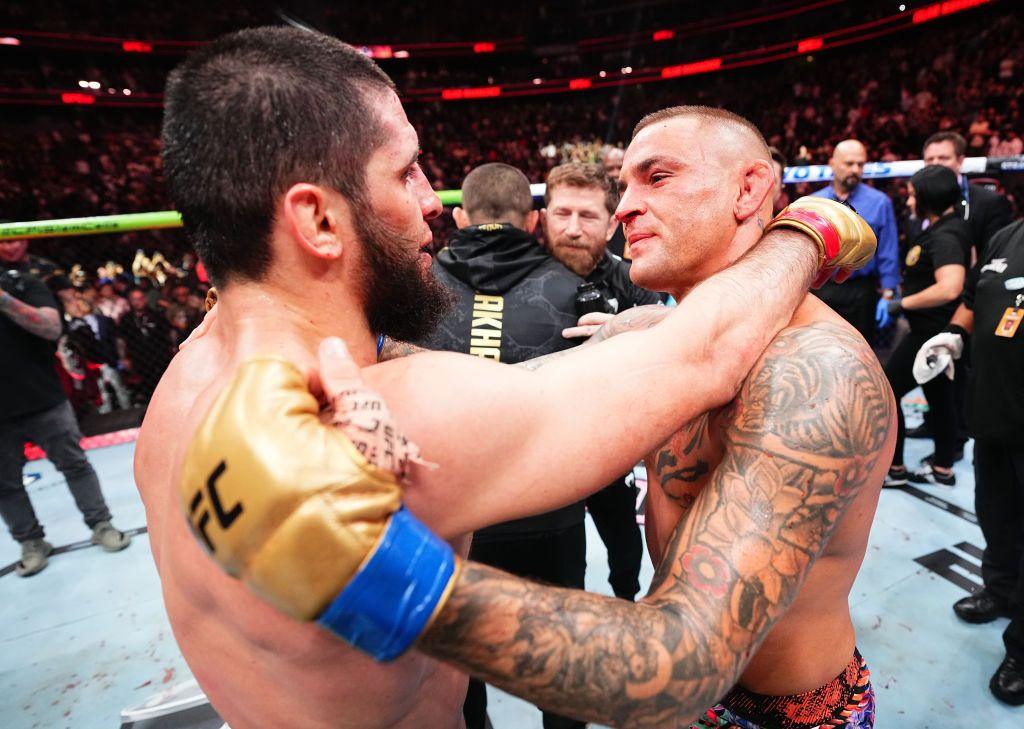 Islam Makhachev and Dustin Poirier embrace after their fight at UFC 302