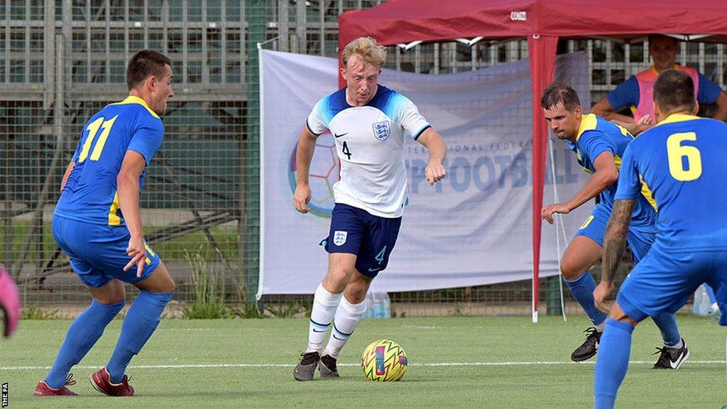 England's Sam Dewhirst tries to find a way through the Ukraine defence at the Cerebral Palsy European Championships