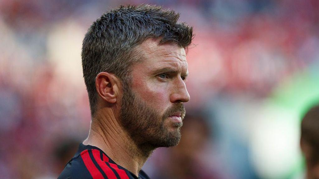 Image of Michael Carrick looking on following the pre-season match between AC Milan and Manchester United on August 15 2026