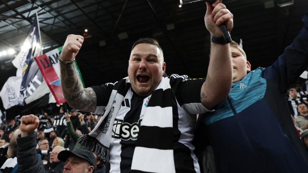 Newcastle fans celebrate reaching the EFL Cup final 