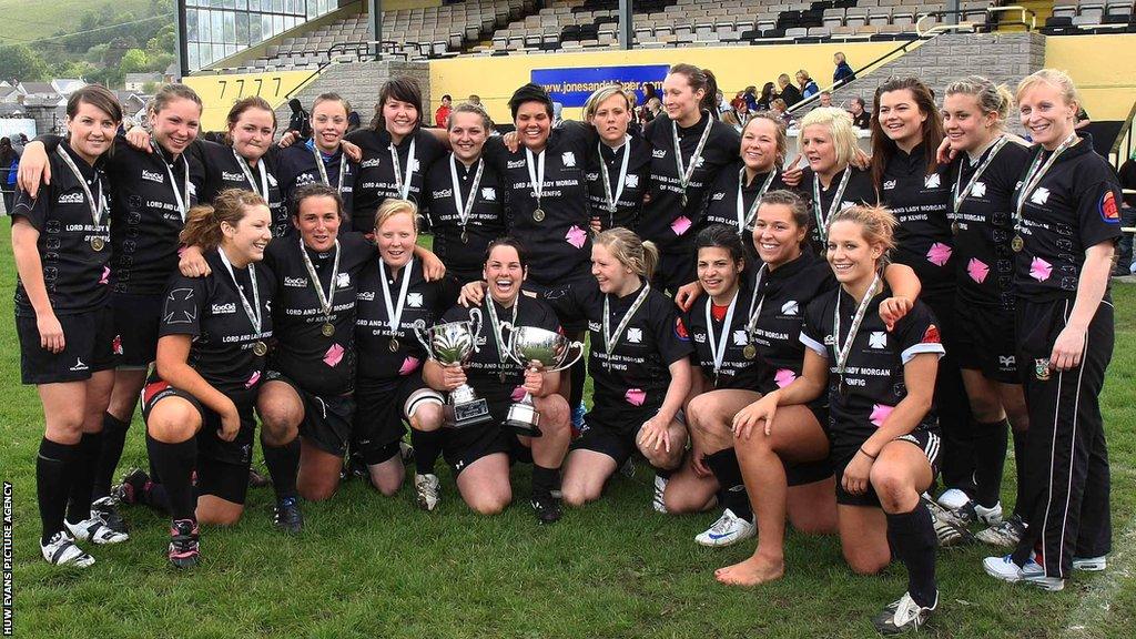 Stephanie Evans (front left) celebrates winning the Women's Welsh Cup with Neath Athletic against Pontyclun in 2011. Future Wales captain Siwan Lillicrap (second left front) and Wales centre Kerin Lake (far right front) were team-mates.