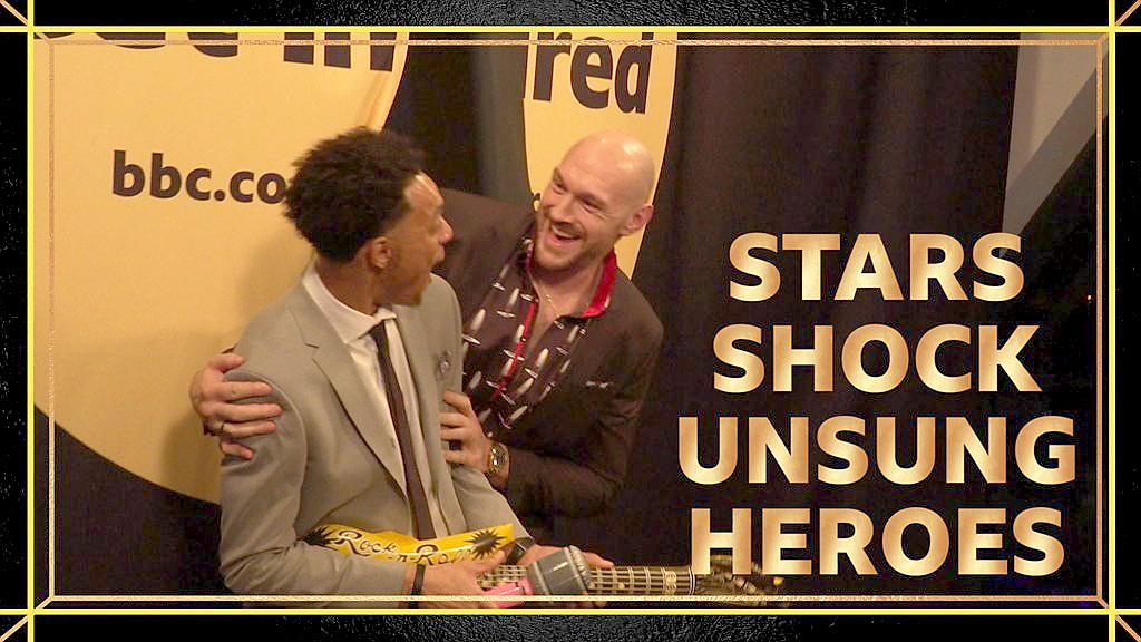 Tyson Fury (r) surprises Wales' Unsung Hero Asa Waite (l)