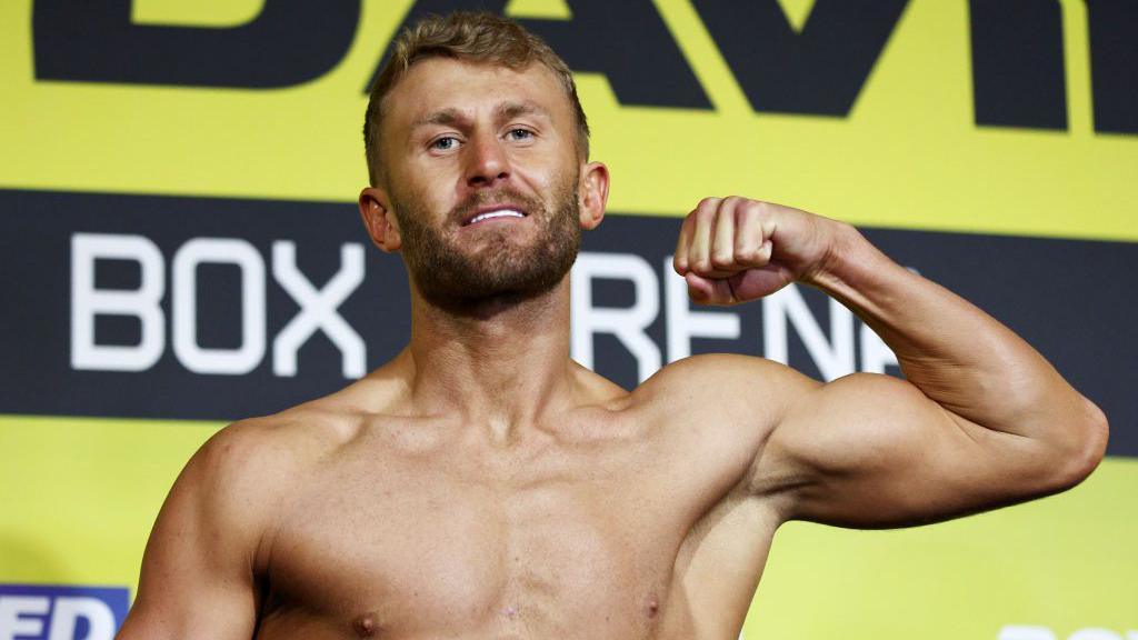 Lewis Edmondson poses at the weight in for his fight against Dan Azeez in London