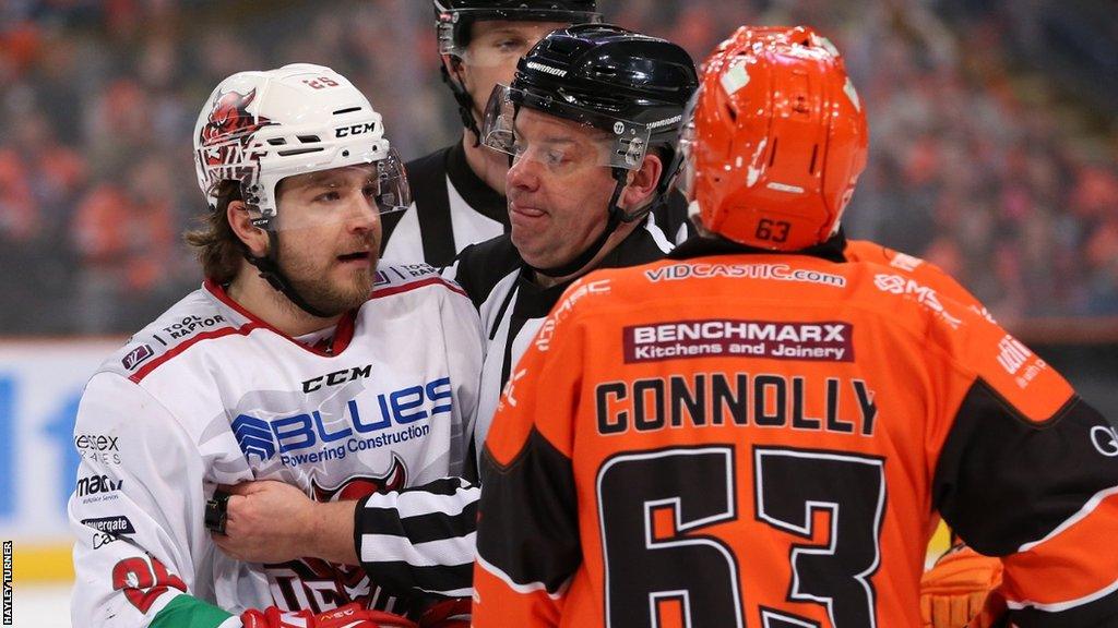 Riley Brandy (left) of Cardiff Devils and Brendan Connolly (right) of Sheffield Steelers drop the gloves