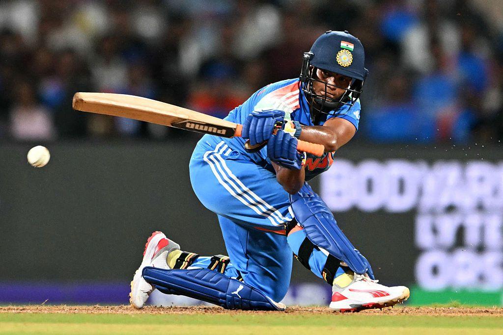 India's Deepti Sharma plays a shot during the ICC Women's Cricket World Cup 2025 one-day international (ODI) final match between India and South Africa at the DY Patil Stadium in Navi Mumbai on November 2, 2025. (Photo by Punit PARANJPE / AFP) / -- IMAGE RESTRICTED TO EDITORIAL USE - STRICTLY NO COMMERCIAL USE -- (Photo by PUNIT PARANJPE/AFP via Getty Images)