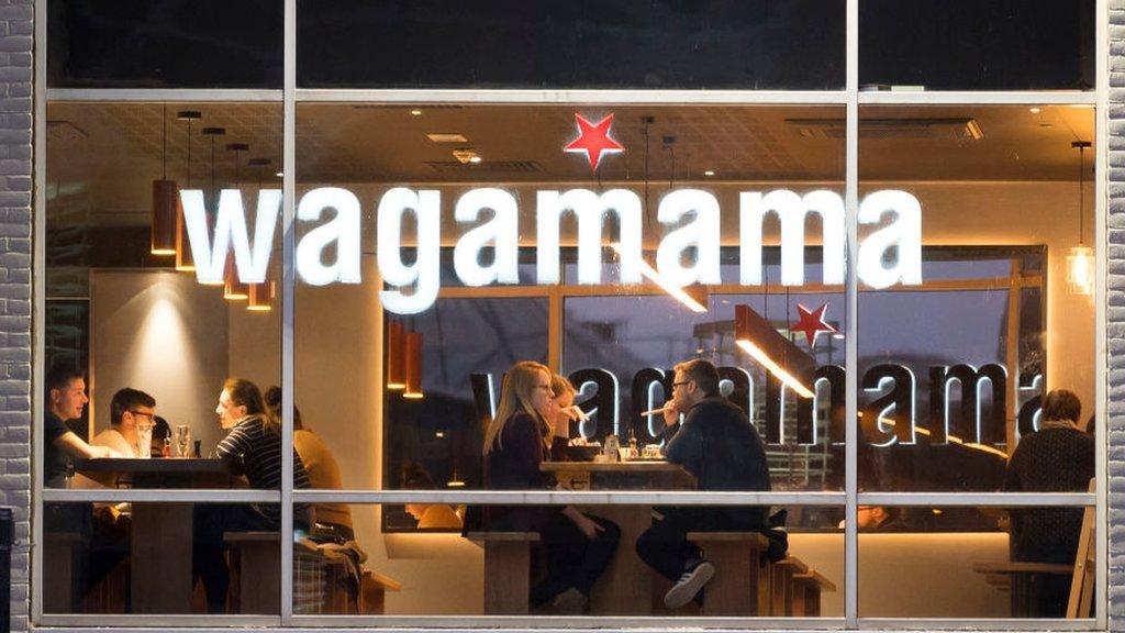 Diners in a Wagamama restaurant.