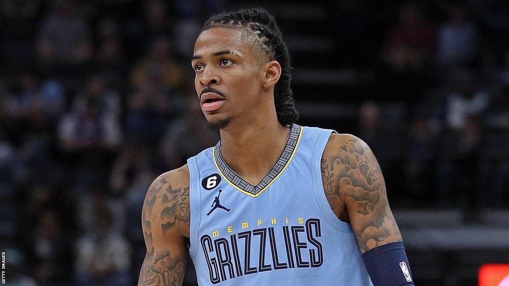 Memphis Grizzlies guard Ja Morant looks on during an NBA game