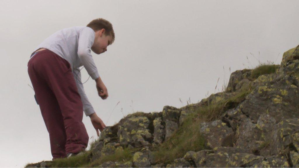 Ethan Loch climbing a hill