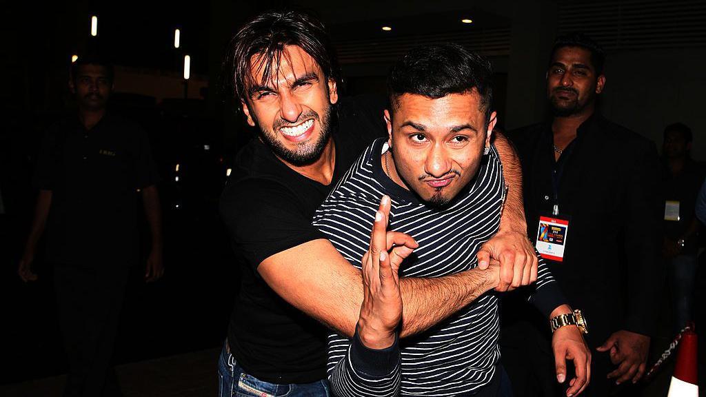 Ranveer Singh (L) wearing a black tshirt and blue jeans and Honey Singh (R) wearing a black and white stripped sweatshirt and blue jeans at the Zee Cine Awards 2014 in Mumbai