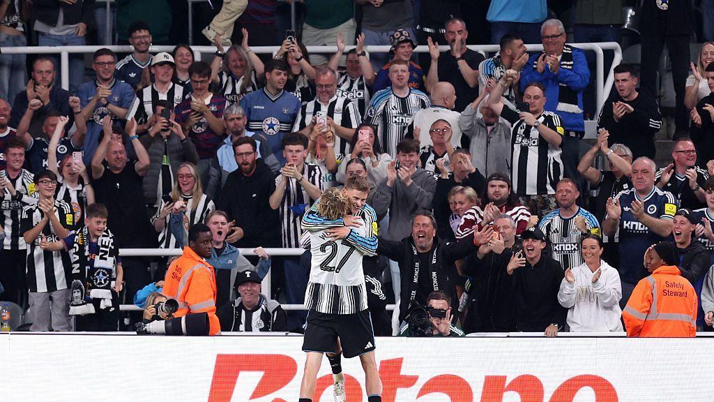 Harvey Barnes celebrates with Nick Woltemade after scoring against West Brom on 26 August, 2026