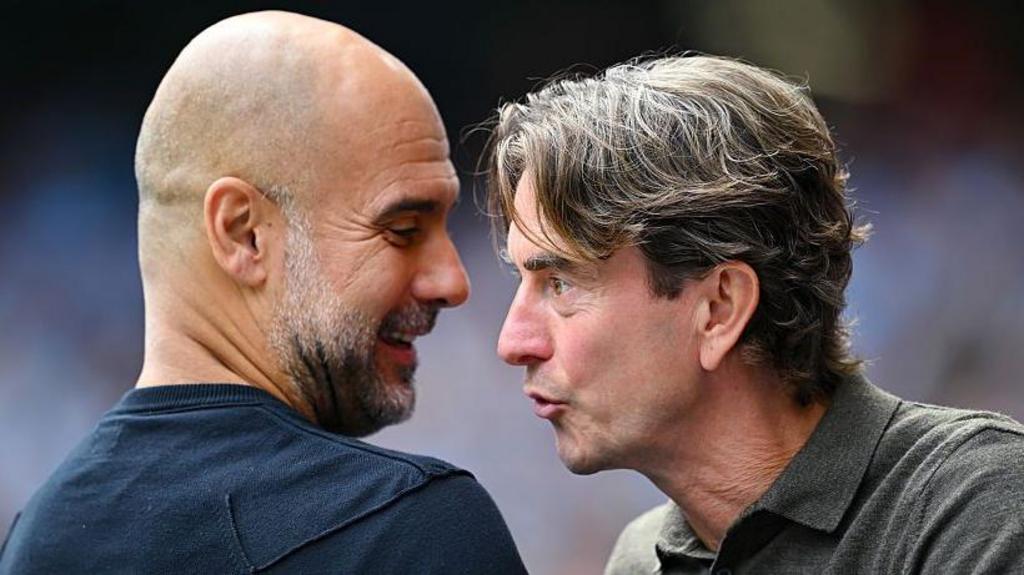 Pep Gurdiola and Thomas Frank