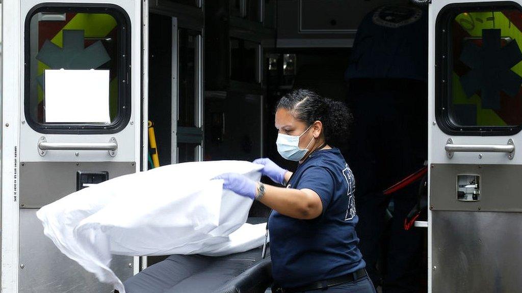 Paramedic at back of US ambulance