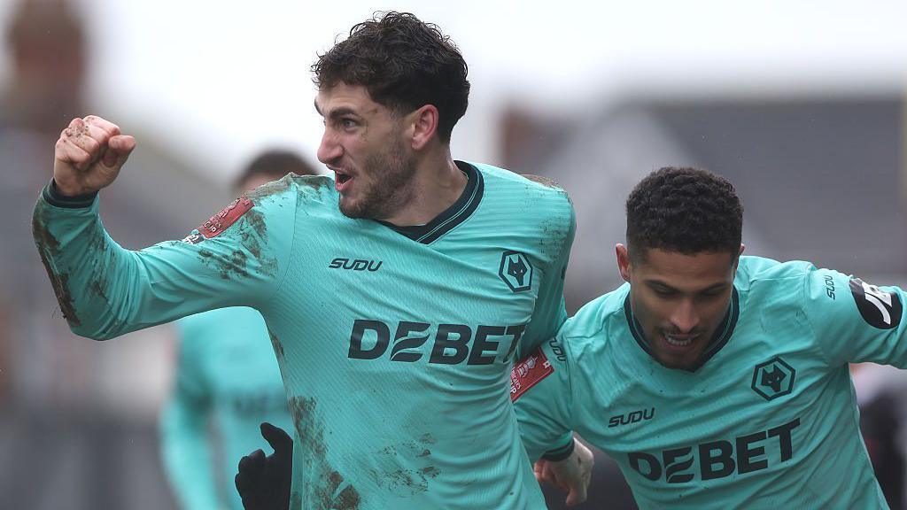 Santiago Bueno celebrates scoring for Wolves at Grimsby in the FA Cup