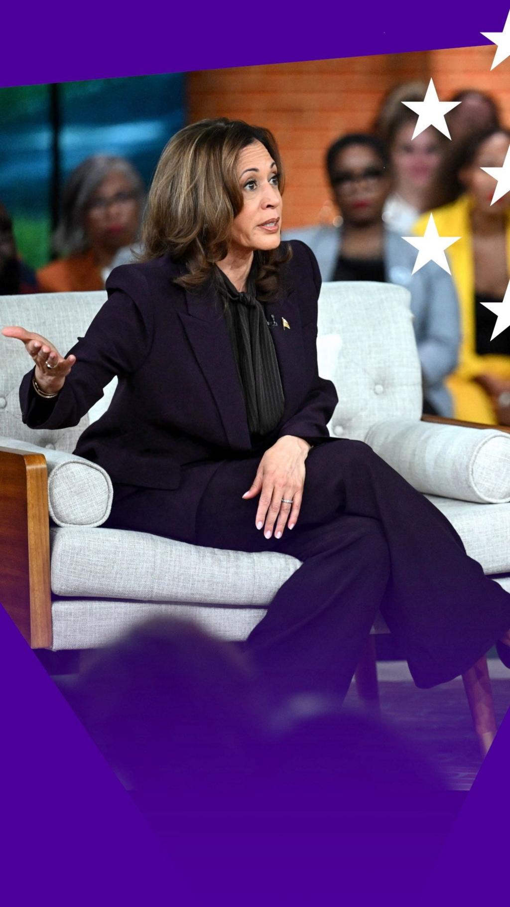 Kamala Harris speaking on the sofa during her interview with Oprah