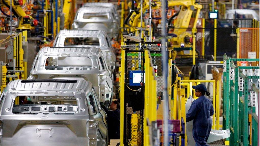 Major carmakers are suing the US government over import taxes.