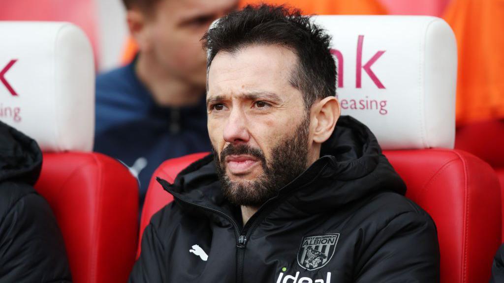 West Brom manager Carlos Corberan watching his team play