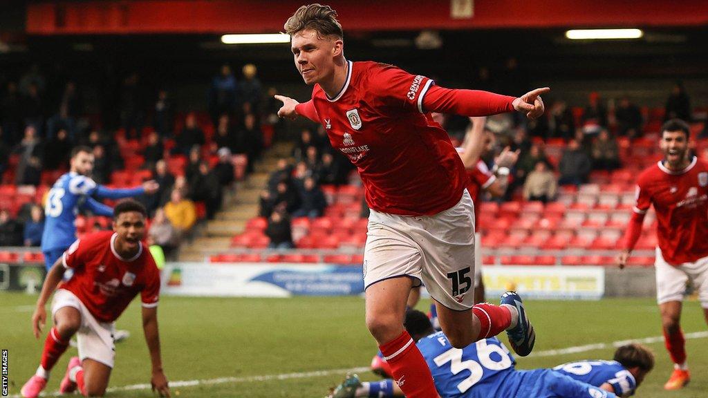 Connor O Riordan celebrates