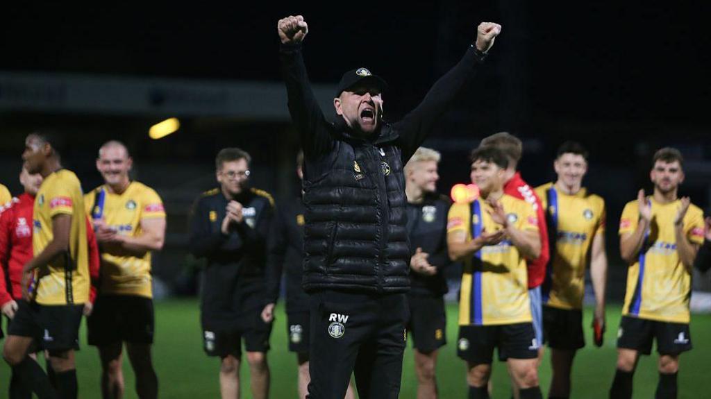 Gainsborough boss Russ Wilcox celebrates their win over Hartlepool