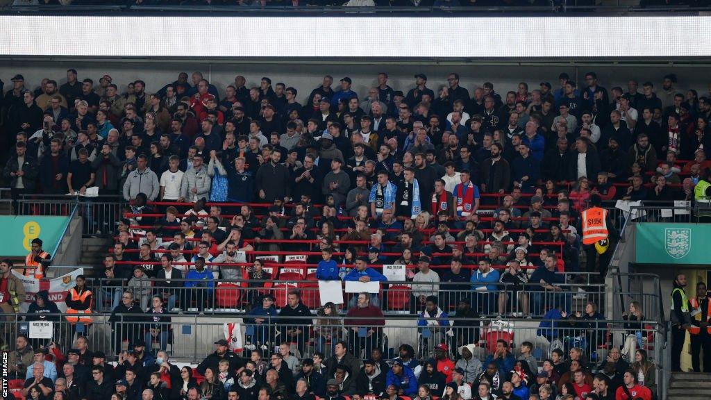 Fans in the safe standing area at Wembley Stadium