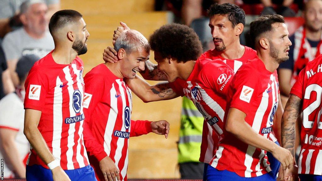 Atletico Madrid celebrate after Antoine Griezmann scores the opening goal of a 7-0 La Liga win over Rayo Vallecan