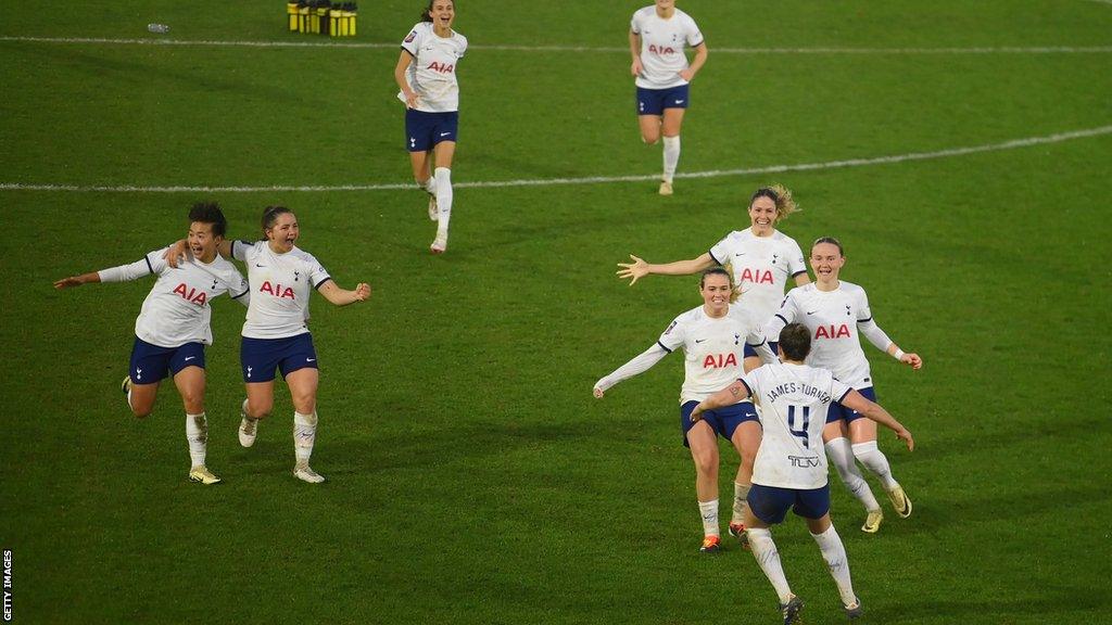 Tottenham celebrate after beating Manchester City on penalties