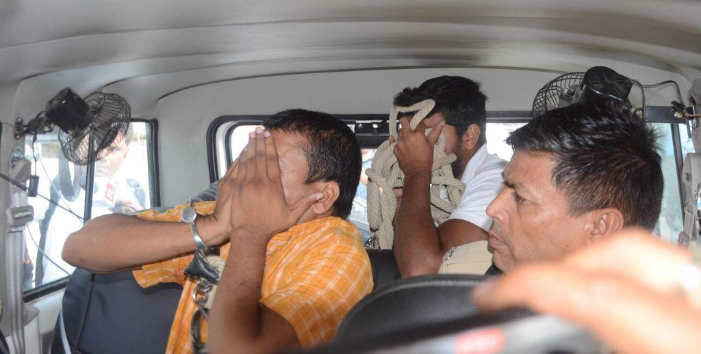 PATNA, INDIA - JUNE 23: Police taking the accused of NEET paper leak case, arrested by EOU from Deoghar, to the court after medical checkup from Shastri Nagar LNJP hospital, on June 23, 2024 in Patna, India. (Photo by Santosh Kumar/Hindustan Times via Getty Images)