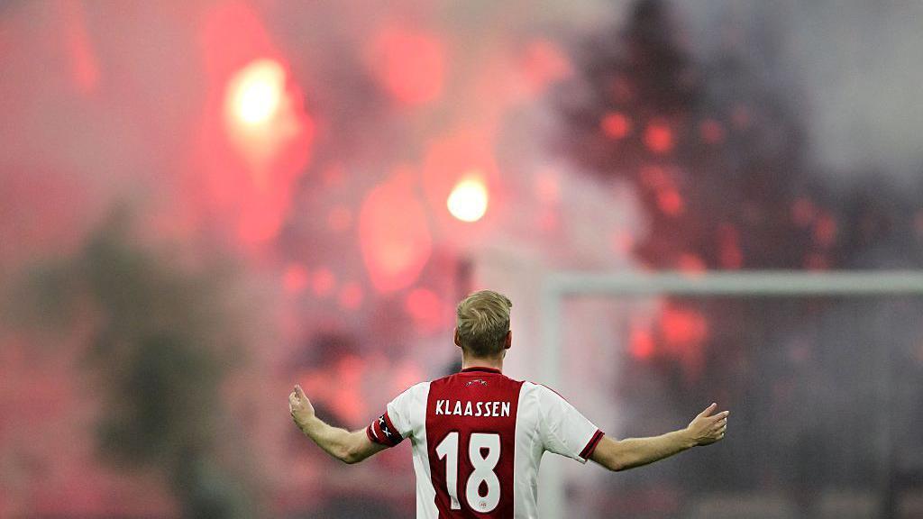 Ajax's Davy Klaassen gestures towards the crowd