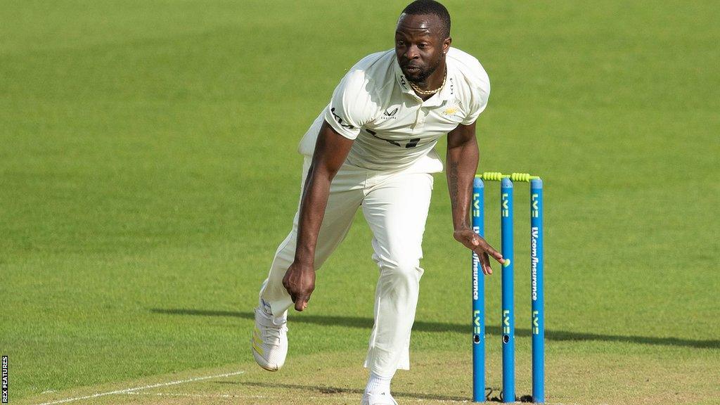 Kemar Roach bowling for Surrey